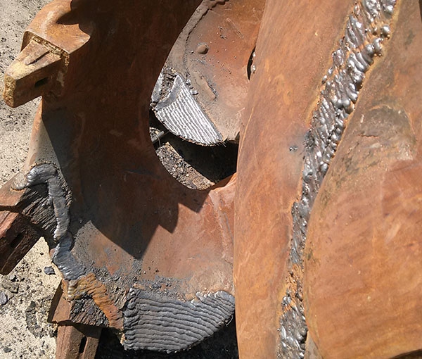 Dredging wheel crawling tooth repair