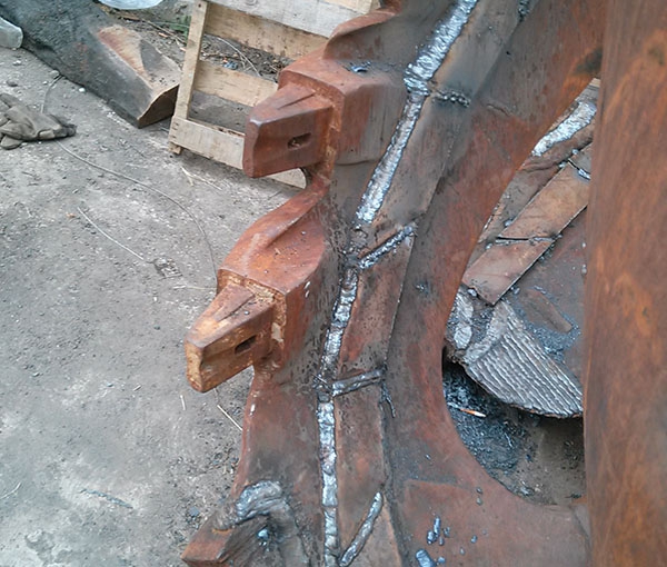 Dredging wheel crawling tooth repair